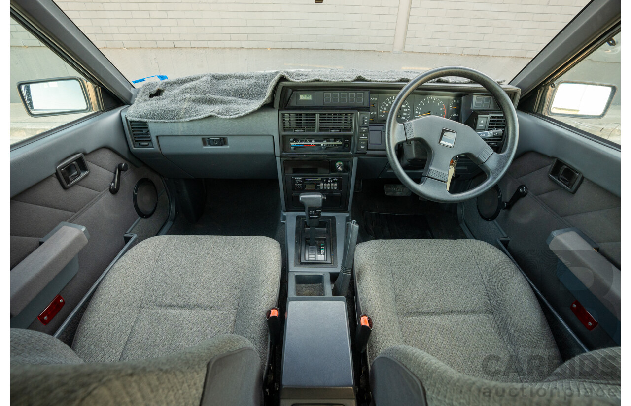 5/1990 Nissan Skyline GXE R31 4d Sedan White 3.0L
