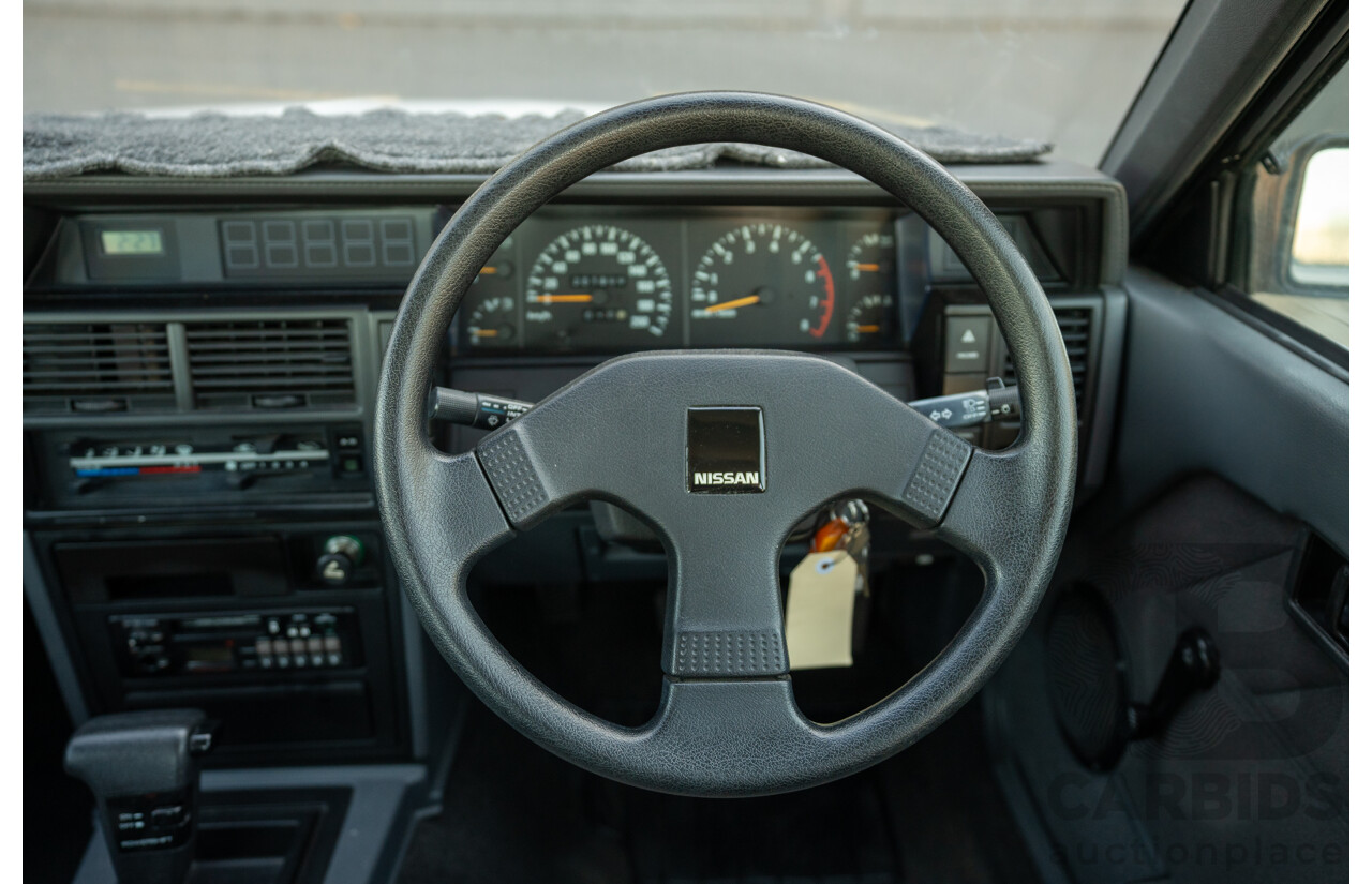 5/1990 Nissan Skyline GXE R31 4d Sedan White 3.0L