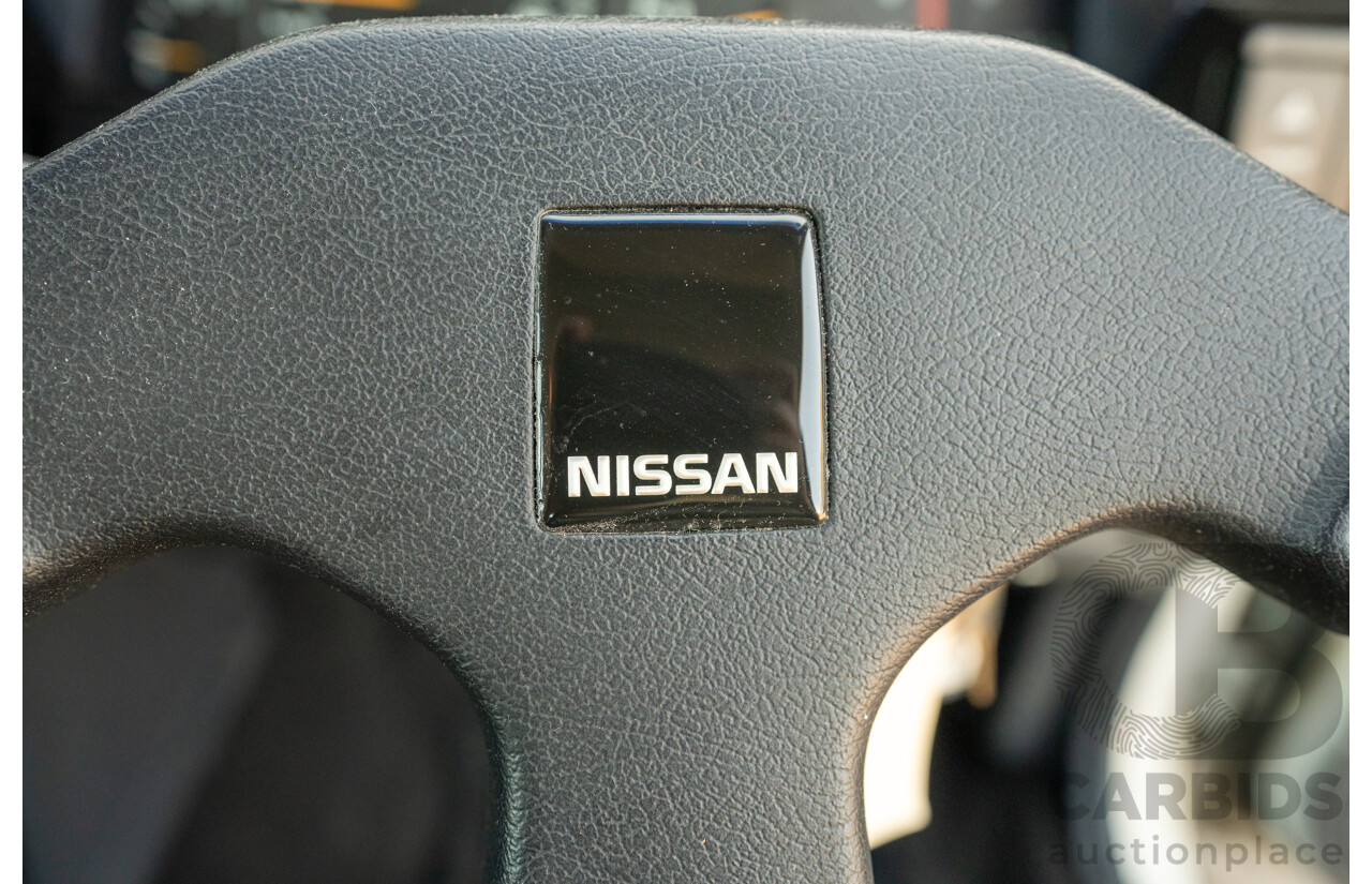 5/1990 Nissan Skyline GXE R31 4d Sedan White 3.0L