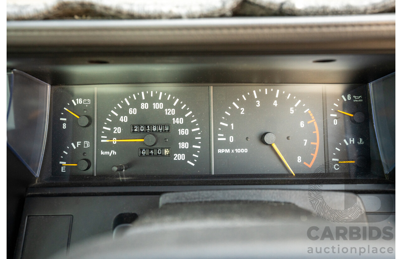 5/1990 Nissan Skyline GXE R31 4d Sedan White 3.0L