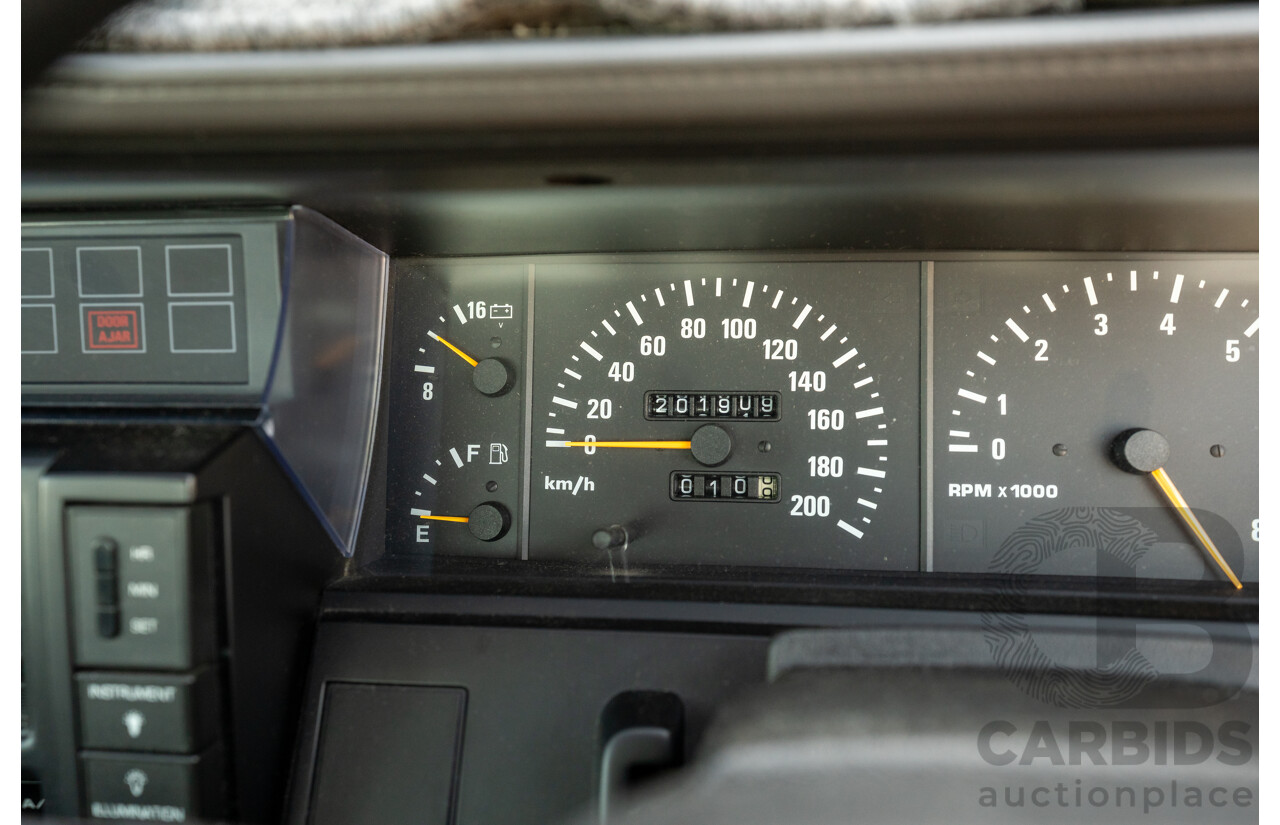5/1990 Nissan Skyline GXE R31 4d Sedan White 3.0L