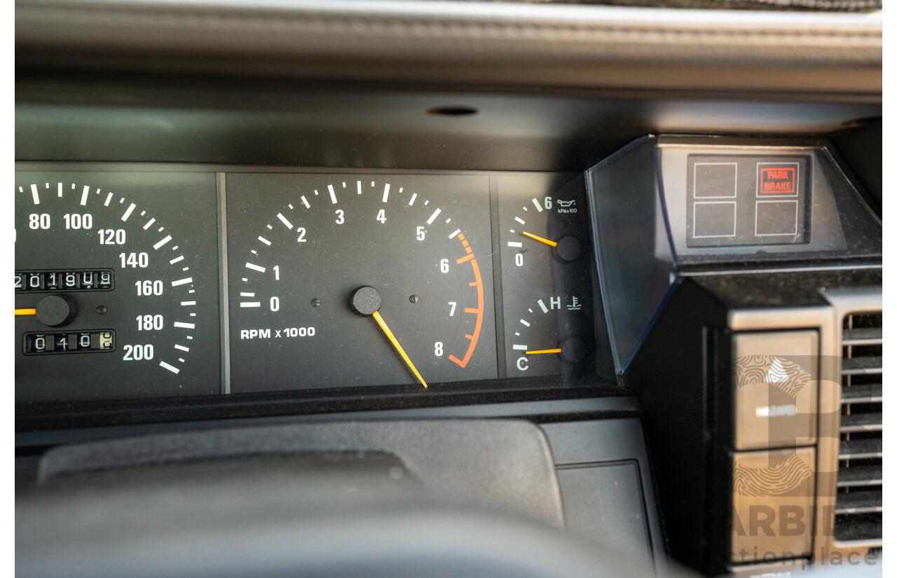 5/1990 Nissan Skyline GXE R31 4d Sedan White 3.0L