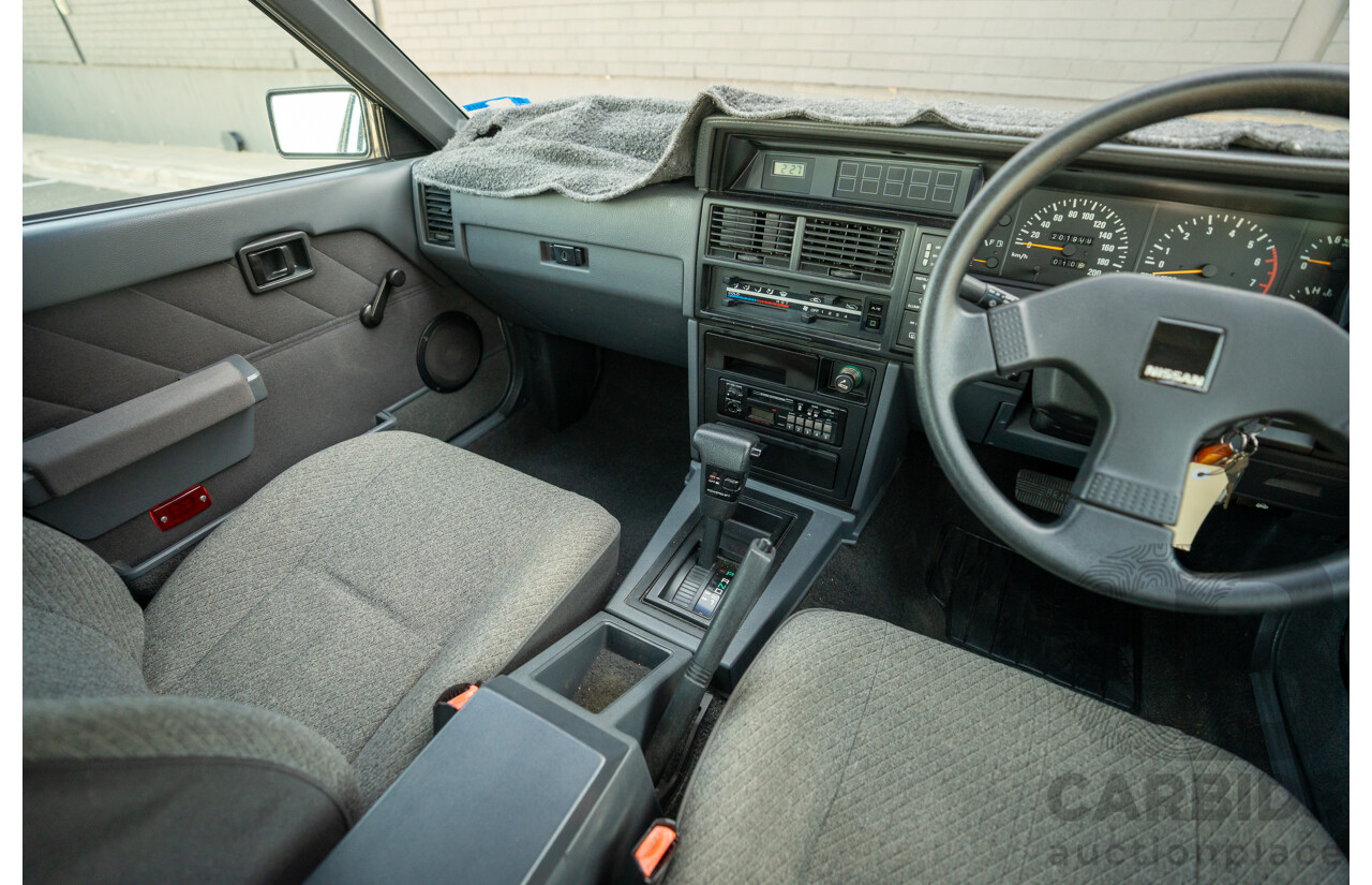 5/1990 Nissan Skyline GXE R31 4d Sedan White 3.0L