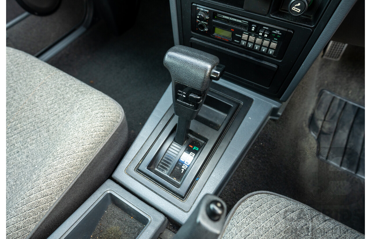 5/1990 Nissan Skyline GXE R31 4d Sedan White 3.0L