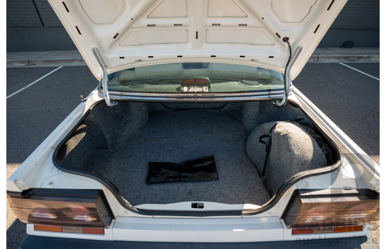 5/1990 Nissan Skyline GXE R31 4d Sedan White 3.0L