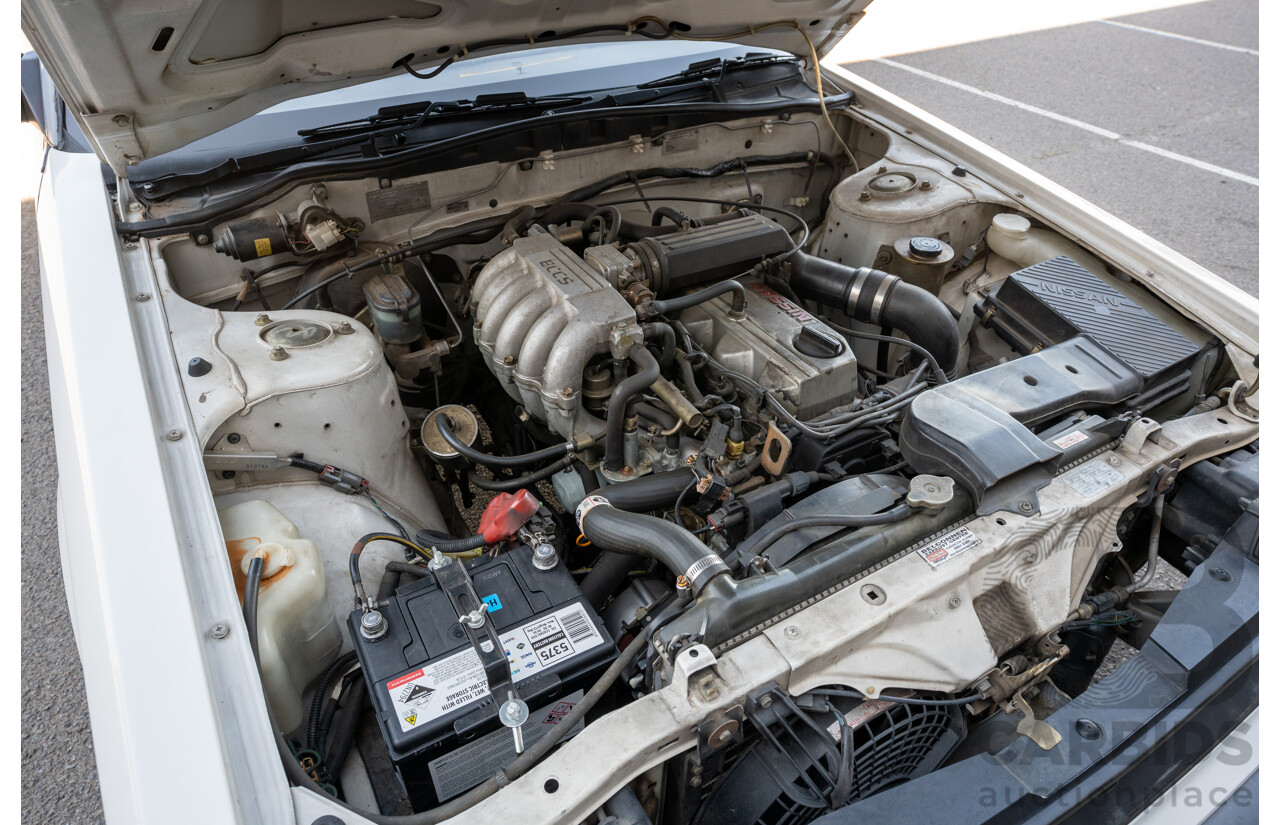 5/1990 Nissan Skyline GXE R31 4d Sedan White 3.0L