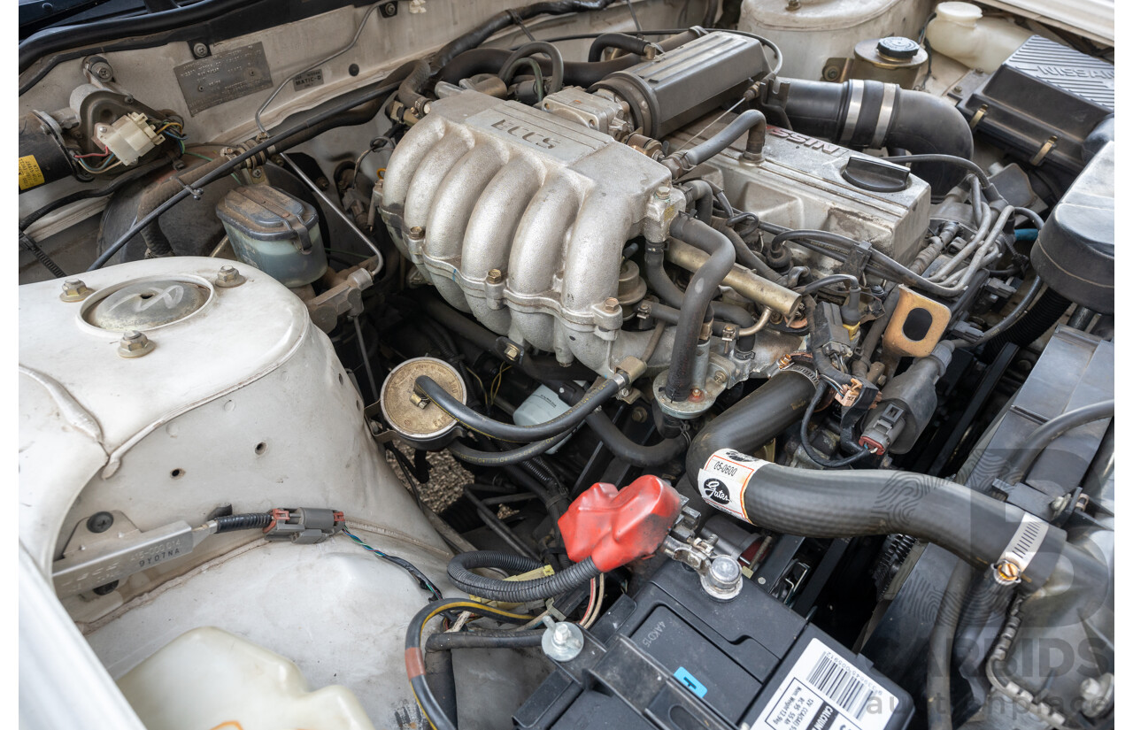 5/1990 Nissan Skyline GXE R31 4d Sedan White 3.0L