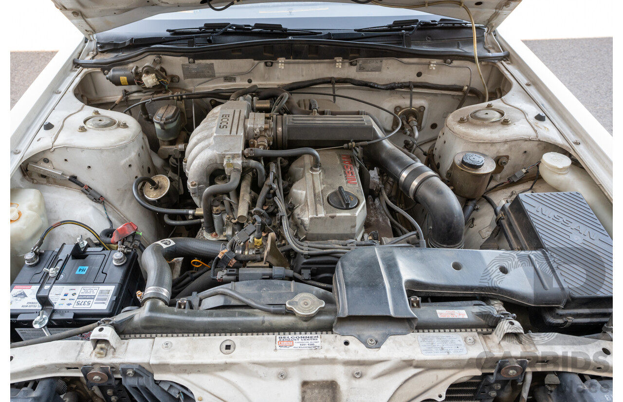5/1990 Nissan Skyline GXE R31 4d Sedan White 3.0L