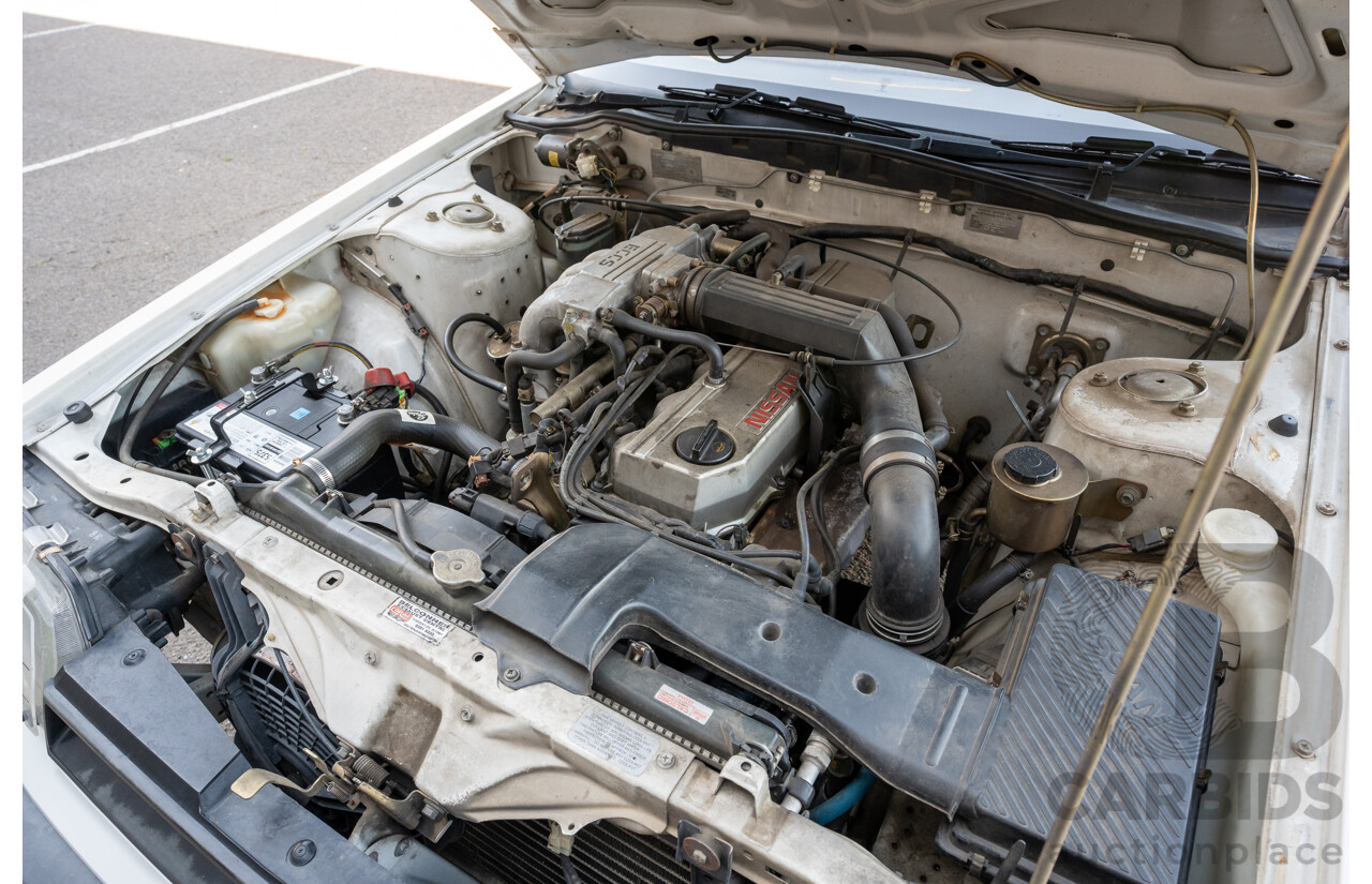 5/1990 Nissan Skyline GXE R31 4d Sedan White 3.0L