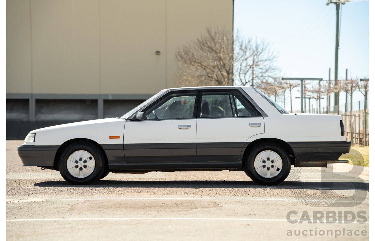 5/1990 Nissan Skyline GXE R31 4d Sedan White 3.0L