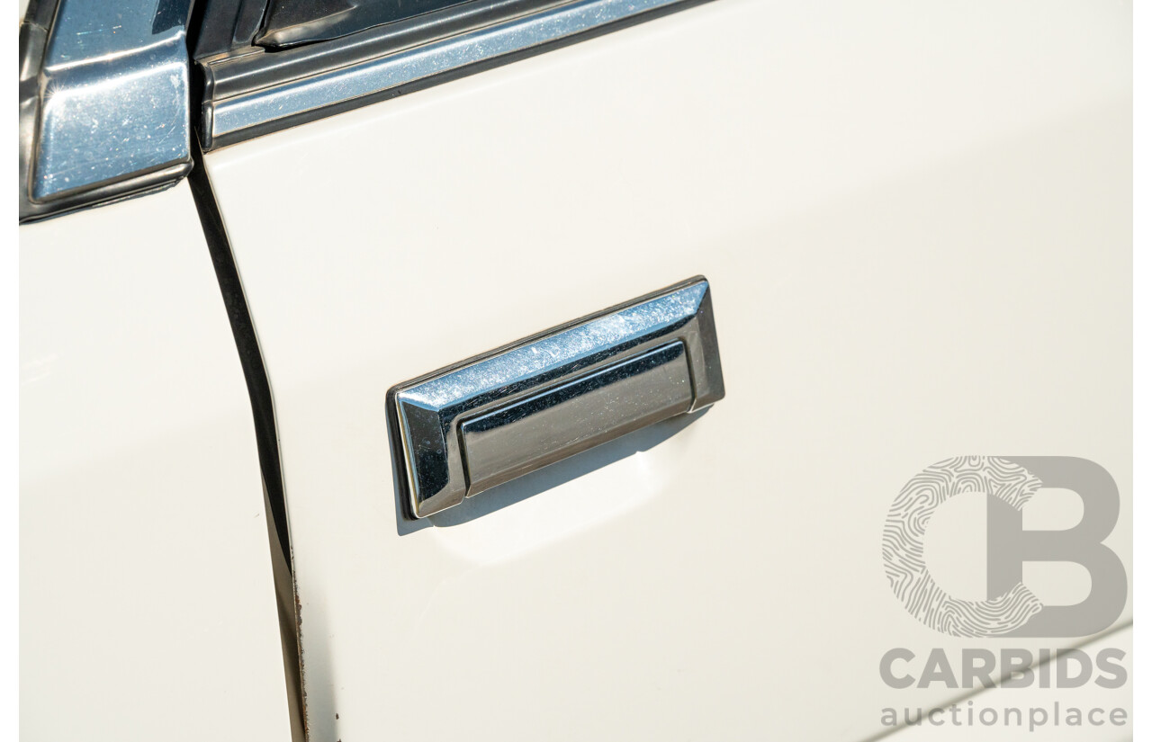 5/1990 Nissan Skyline GXE R31 4d Sedan White 3.0L