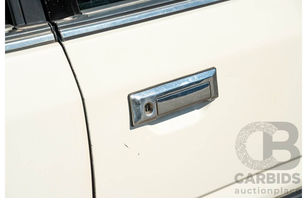 5/1990 Nissan Skyline GXE R31 4d Sedan White 3.0L