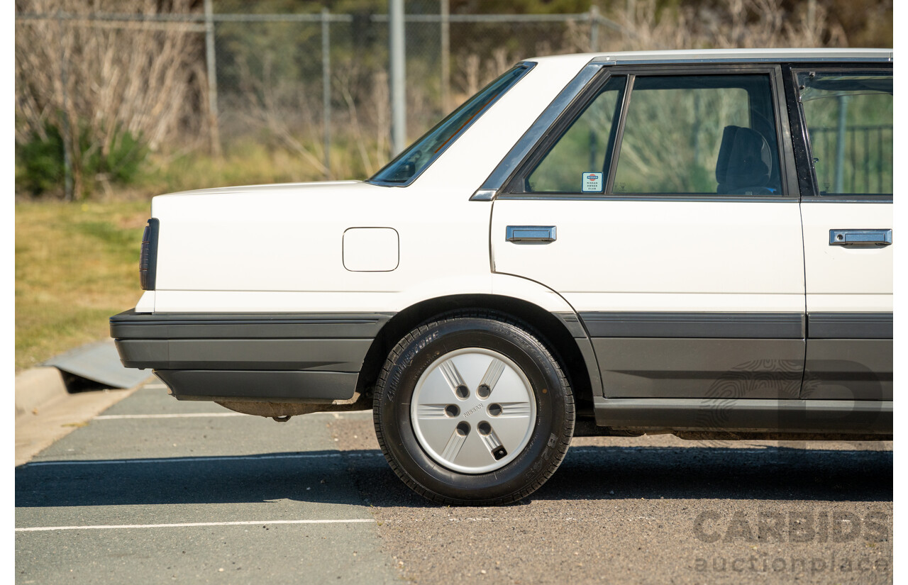 5/1990 Nissan Skyline GXE R31 4d Sedan White 3.0L