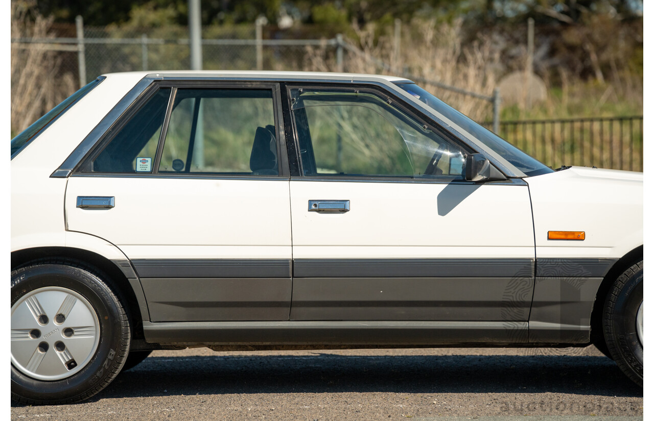 5/1990 Nissan Skyline GXE R31 4d Sedan White 3.0L