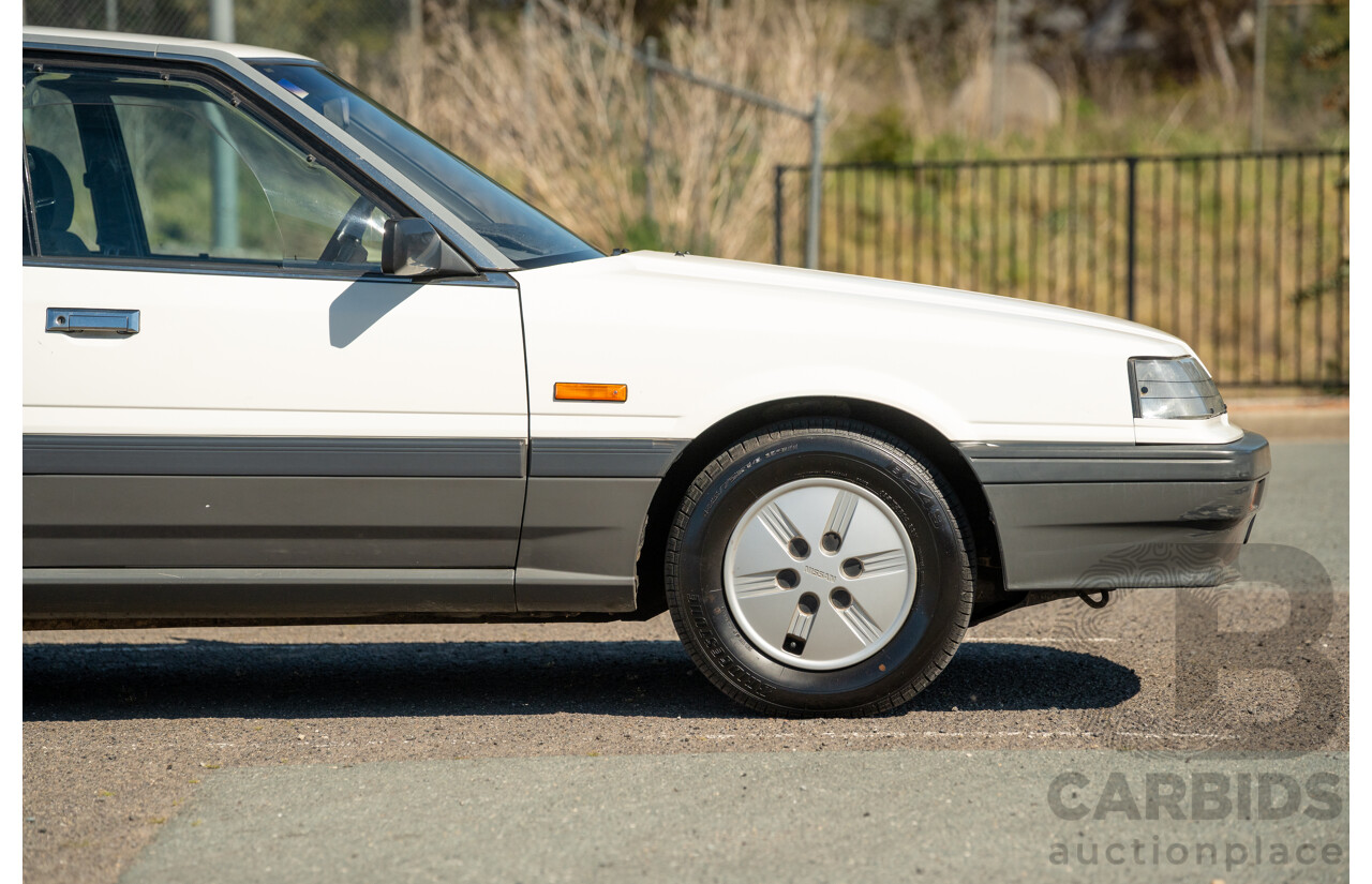 5/1990 Nissan Skyline GXE R31 4d Sedan White 3.0L