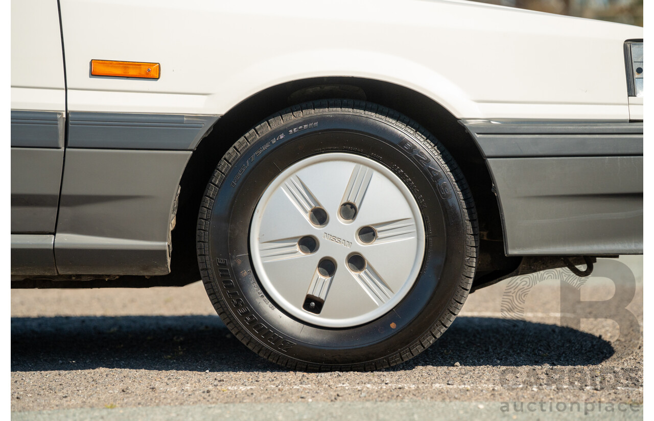 5/1990 Nissan Skyline GXE R31 4d Sedan White 3.0L