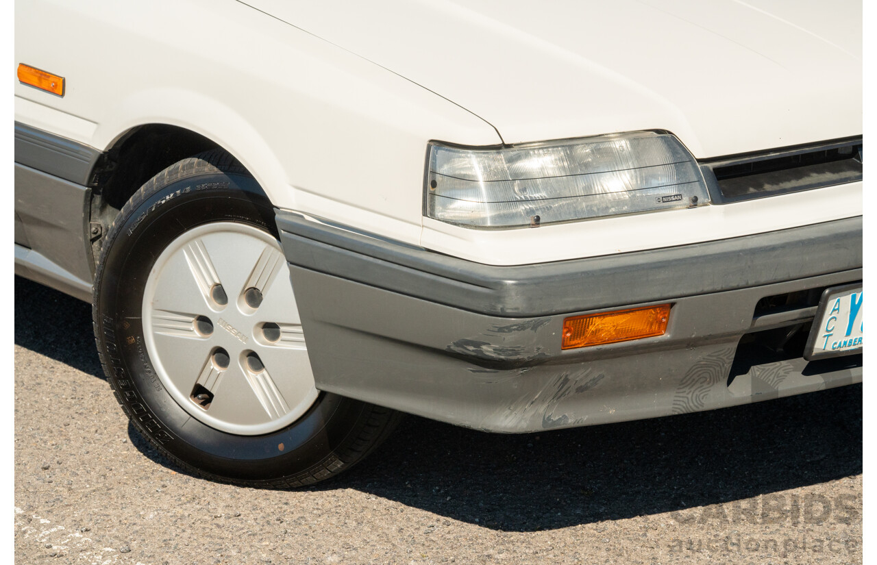 5/1990 Nissan Skyline GXE R31 4d Sedan White 3.0L