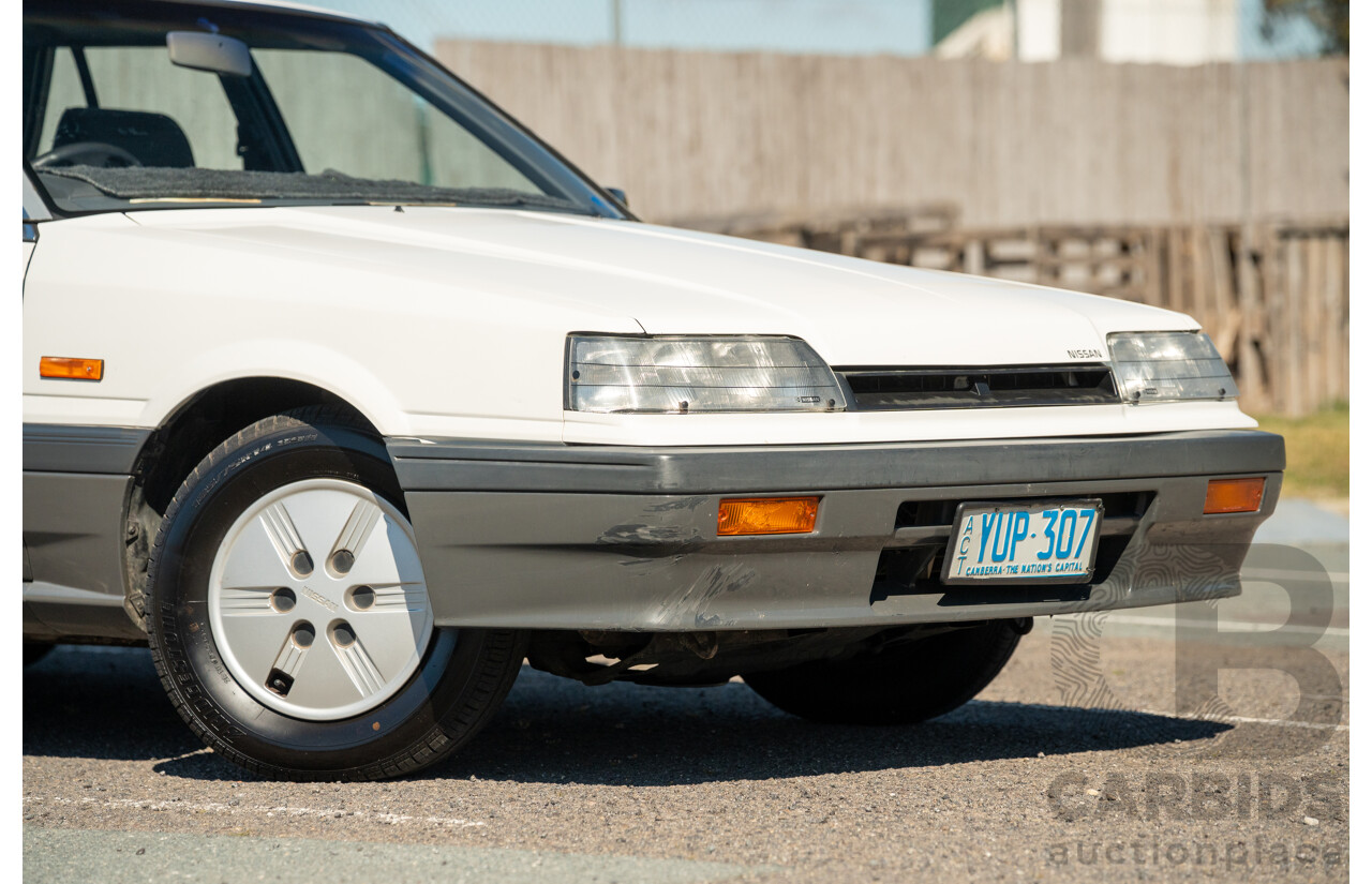 5/1990 Nissan Skyline GXE R31 4d Sedan White 3.0L