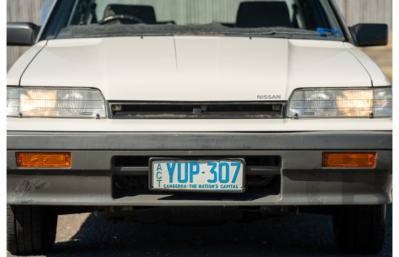 5/1990 Nissan Skyline GXE R31 4d Sedan White 3.0L