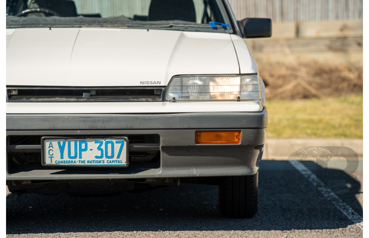 5/1990 Nissan Skyline GXE R31 4d Sedan White 3.0L