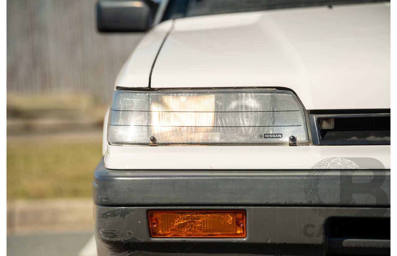 5/1990 Nissan Skyline GXE R31 4d Sedan White 3.0L