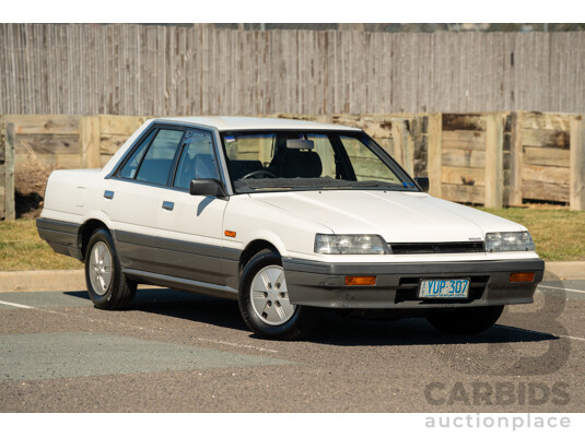 5/1990 Nissan Skyline GXE R31 4d Sedan White 3.0L