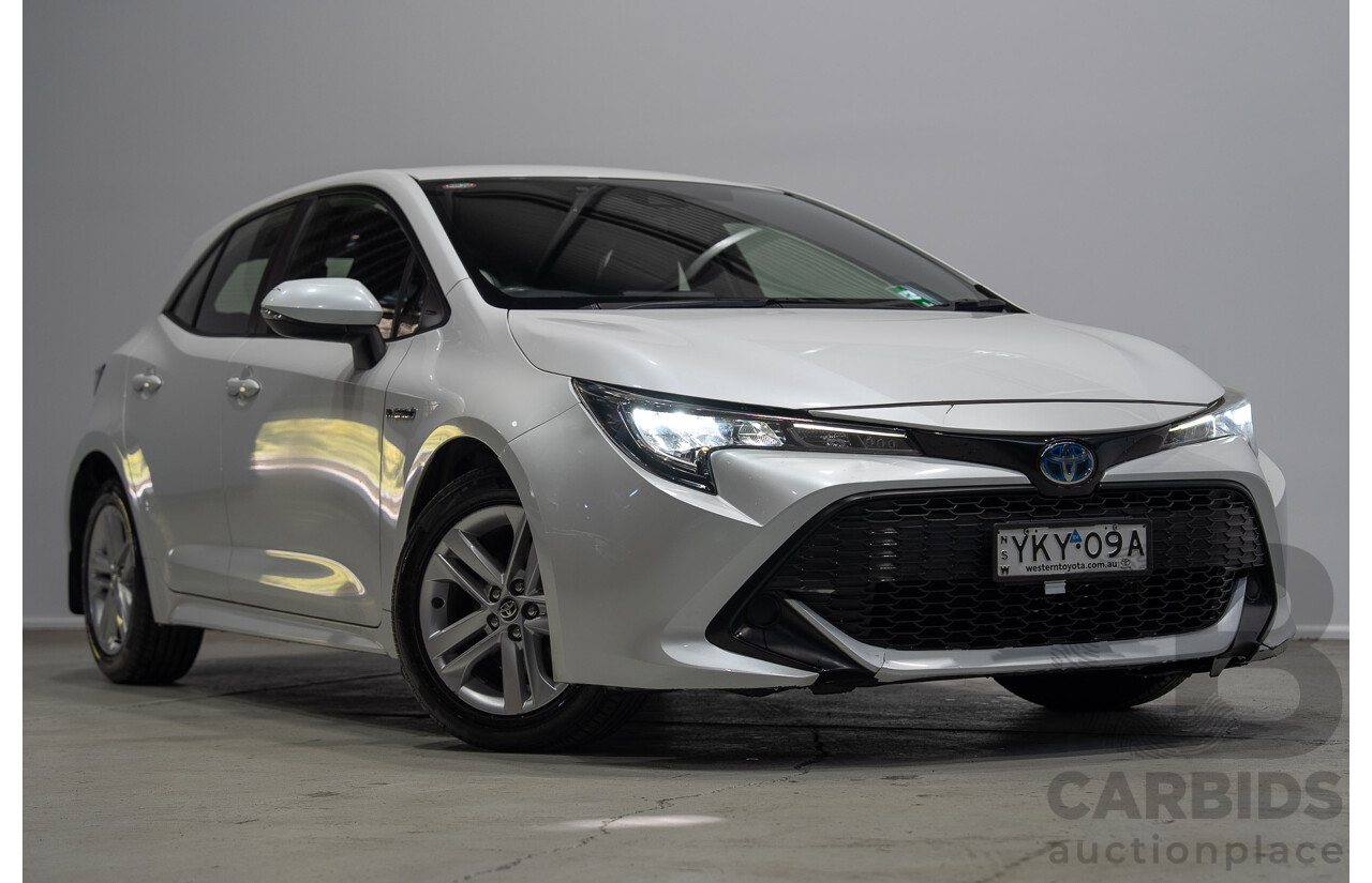 11/2020 Toyota Corolla Ascent Sport HYBRID ZWE211R 5d Hatchback White 1.8L