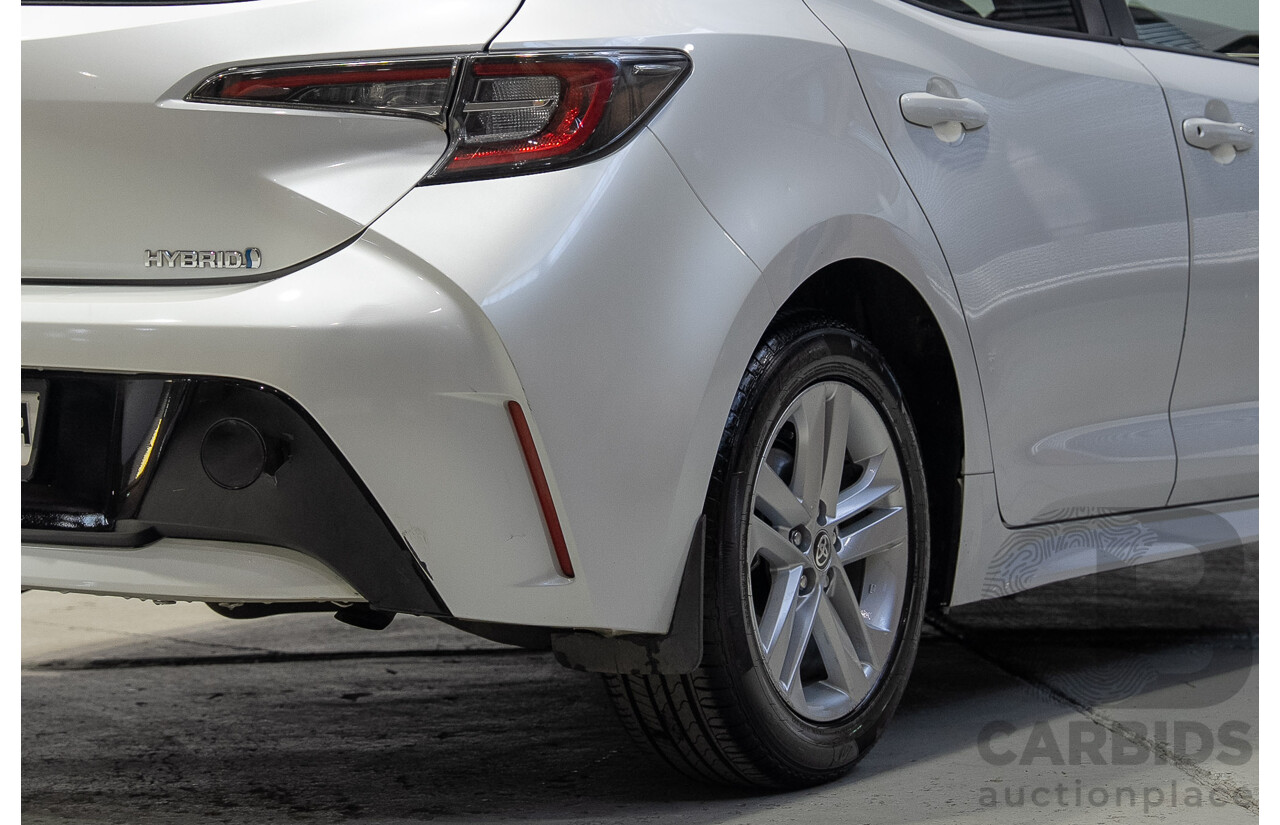 11/2020 Toyota Corolla Ascent Sport HYBRID ZWE211R 5d Hatchback White 1.8L