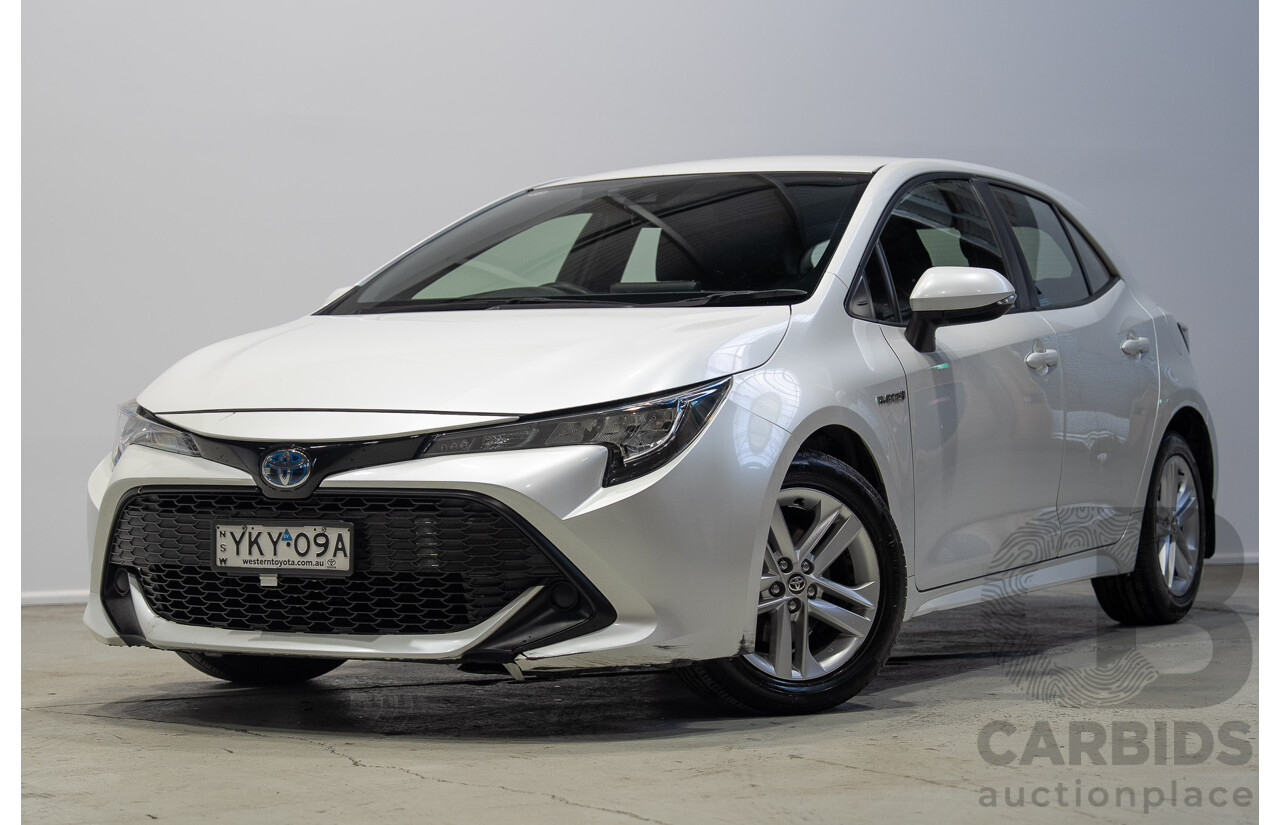 11/2020 Toyota Corolla Ascent Sport HYBRID ZWE211R 5d Hatchback White 1.8L