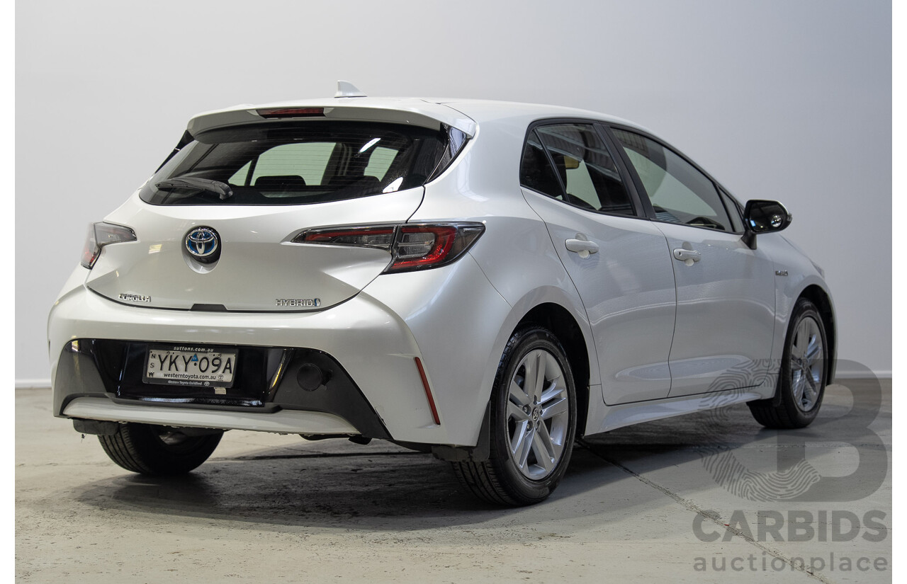 11/2020 Toyota Corolla Ascent Sport HYBRID ZWE211R 5d Hatchback White 1.8L
