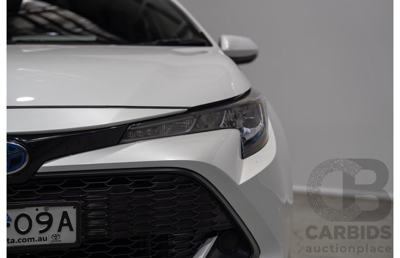 11/2020 Toyota Corolla Ascent Sport HYBRID ZWE211R 5d Hatchback White 1.8L