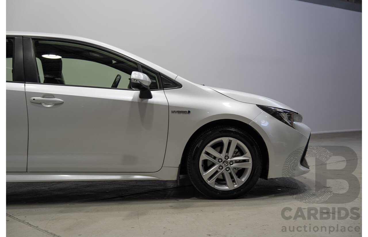 11/2020 Toyota Corolla Ascent Sport HYBRID ZWE211R 5d Hatchback White 1.8L