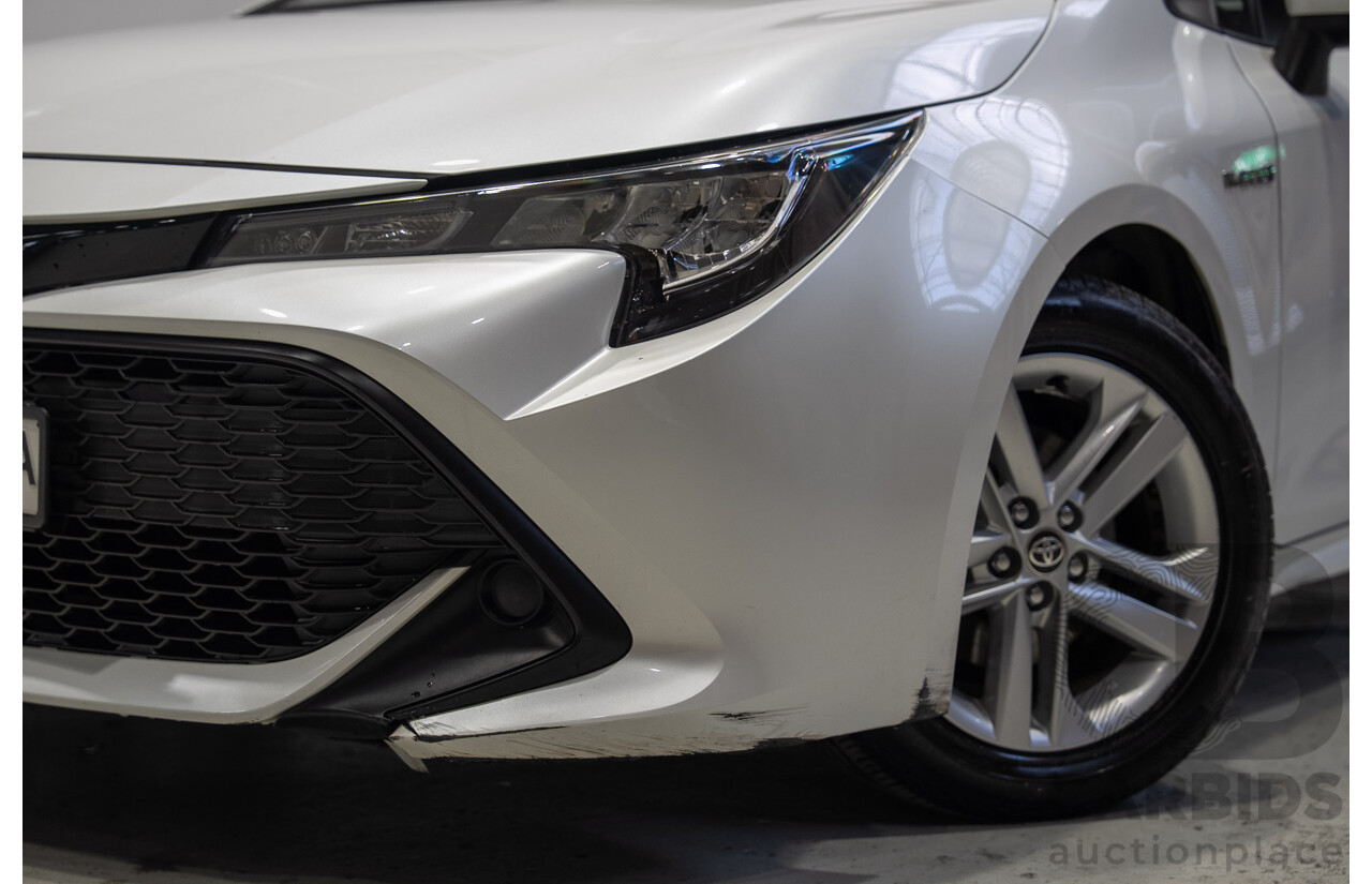 11/2020 Toyota Corolla Ascent Sport HYBRID ZWE211R 5d Hatchback White 1.8L