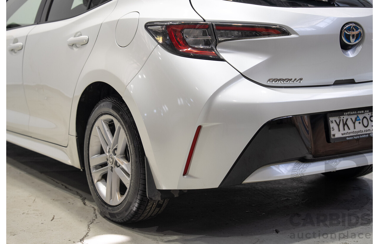 11/2020 Toyota Corolla Ascent Sport HYBRID ZWE211R 5d Hatchback White 1.8L