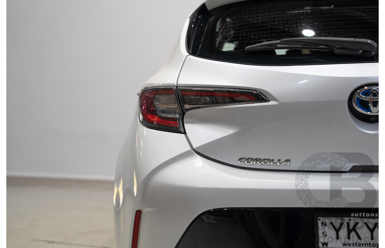 11/2020 Toyota Corolla Ascent Sport HYBRID ZWE211R 5d Hatchback White 1.8L