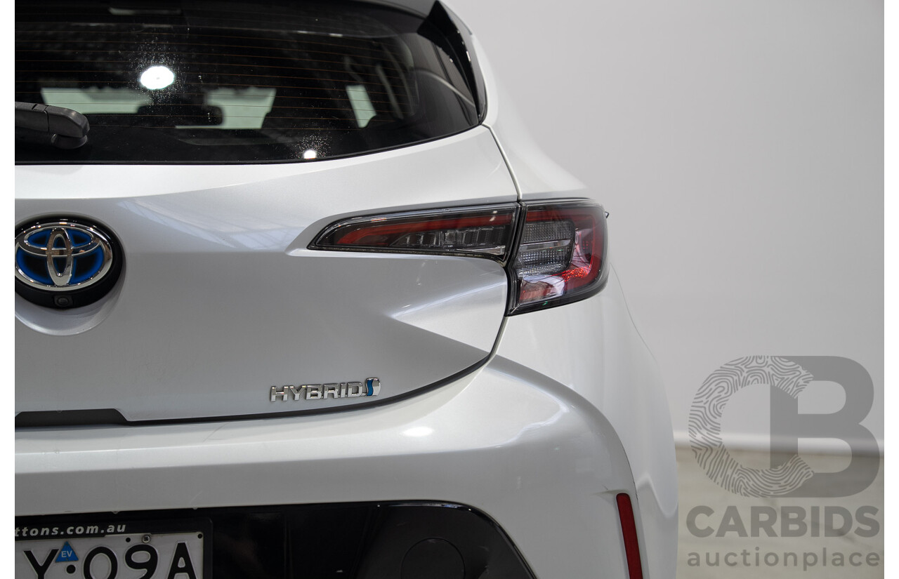 11/2020 Toyota Corolla Ascent Sport HYBRID ZWE211R 5d Hatchback White 1.8L