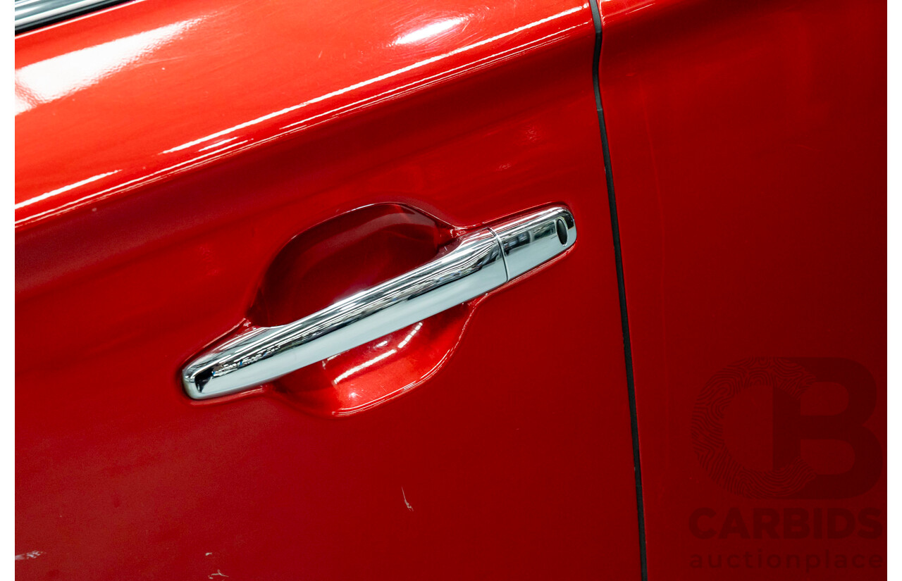 6/2015 Mitsubishi Outlander Exceed (4x4) ZK MY16 4d Wagon Rally Red Metallic Turbo 2.3L - 7 Seater