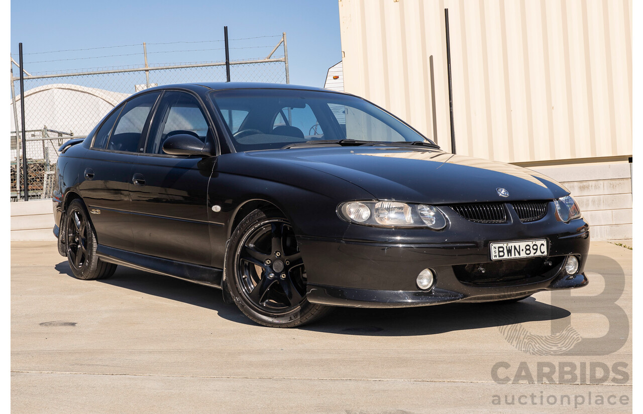 2/2002 Holden Commodore SS VXII 4d Sedan Phantom Black Metallic V8 5.7L