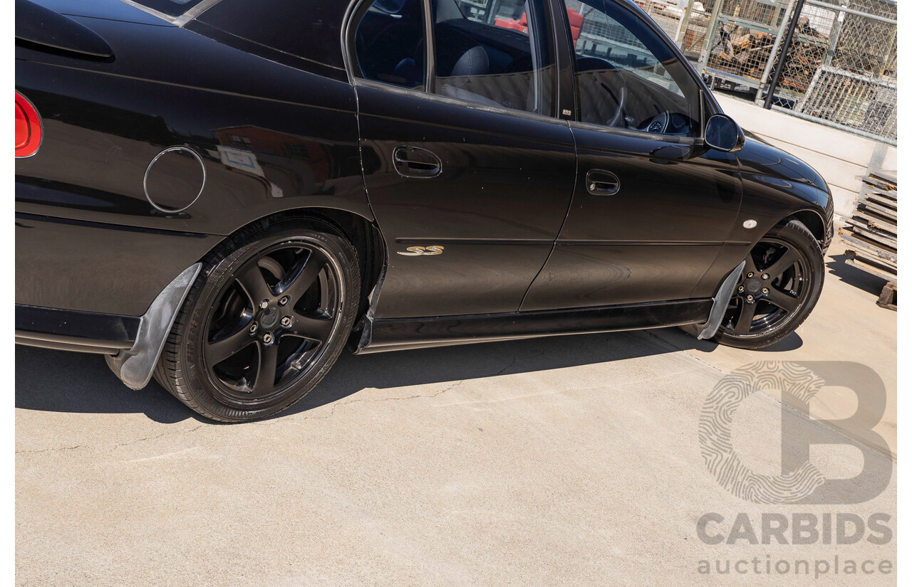 2/2002 Holden Commodore SS VXII 4d Sedan Phantom Black Metallic V8 5.7L