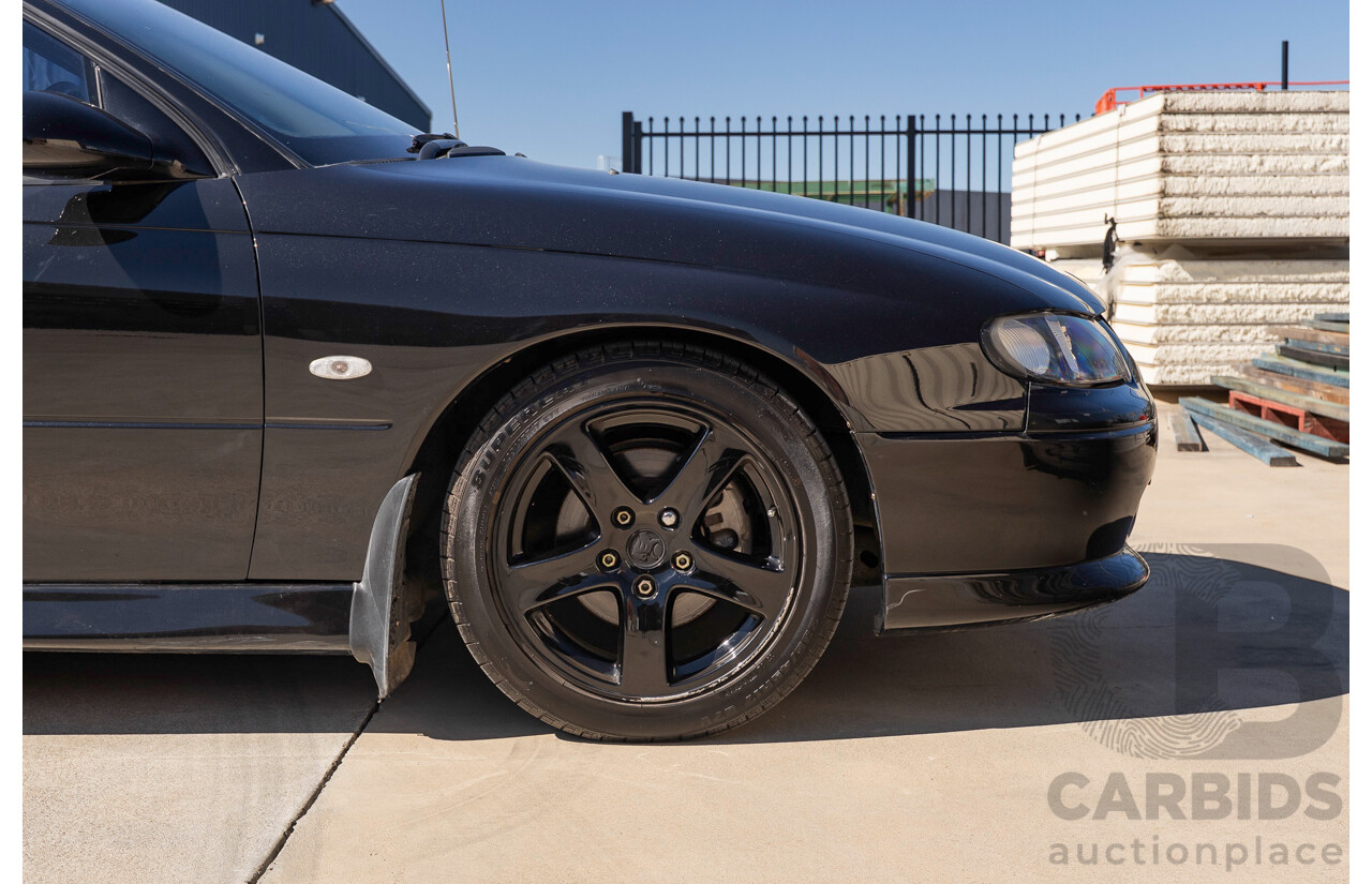 2/2002 Holden Commodore SS VXII 4d Sedan Phantom Black Metallic V8 5.7L