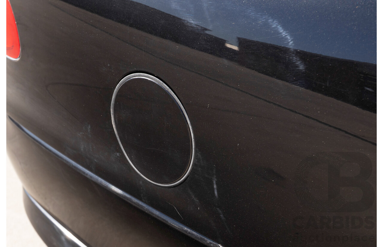 2/2002 Holden Commodore SS VXII 4d Sedan Phantom Black Metallic V8 5.7L