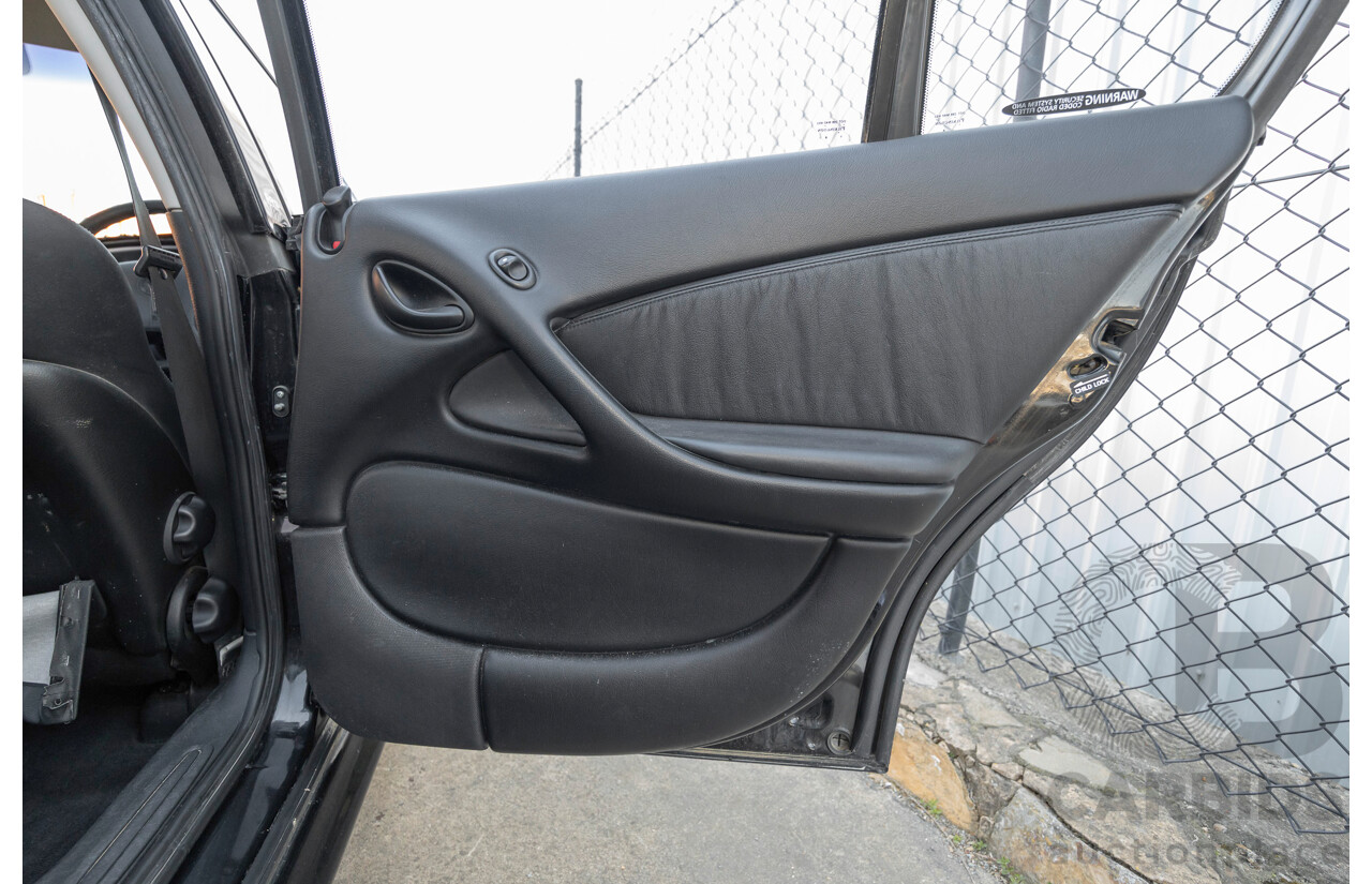 2/2002 Holden Commodore SS VXII 4d Sedan Phantom Black Metallic V8 5.7L