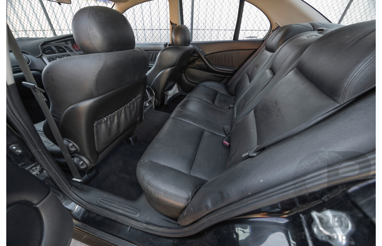 2/2002 Holden Commodore SS VXII 4d Sedan Phantom Black Metallic V8 5.7L