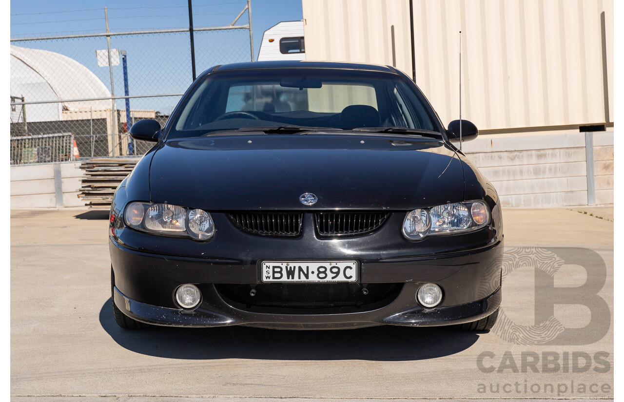 2/2002 Holden Commodore SS VXII 4d Sedan Phantom Black Metallic V8 5.7L