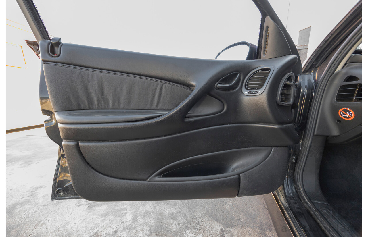 2/2002 Holden Commodore SS VXII 4d Sedan Phantom Black Metallic V8 5.7L