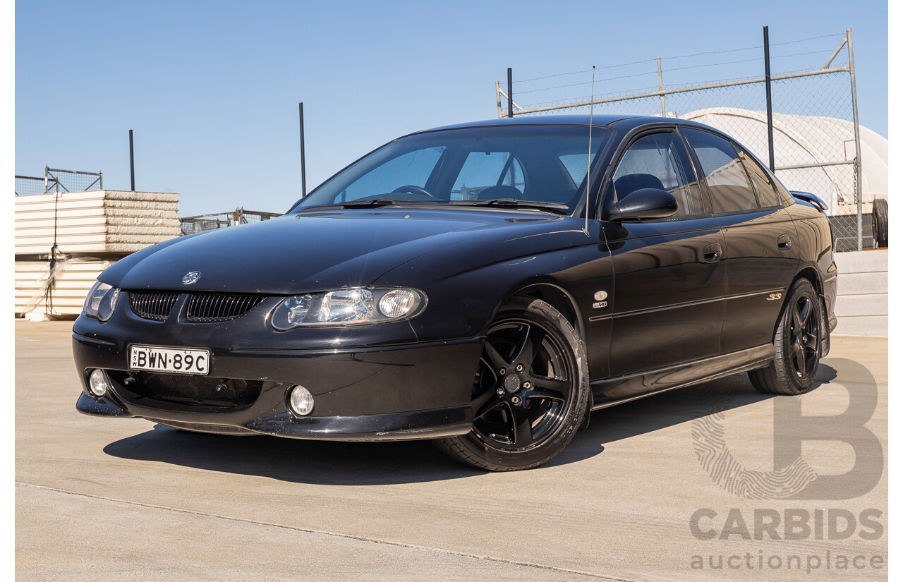 2/2002 Holden Commodore SS VXII 4d Sedan Phantom Black Metallic V8 5.7L
