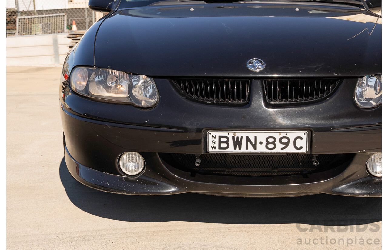 2/2002 Holden Commodore SS VXII 4d Sedan Phantom Black Metallic V8 5.7L