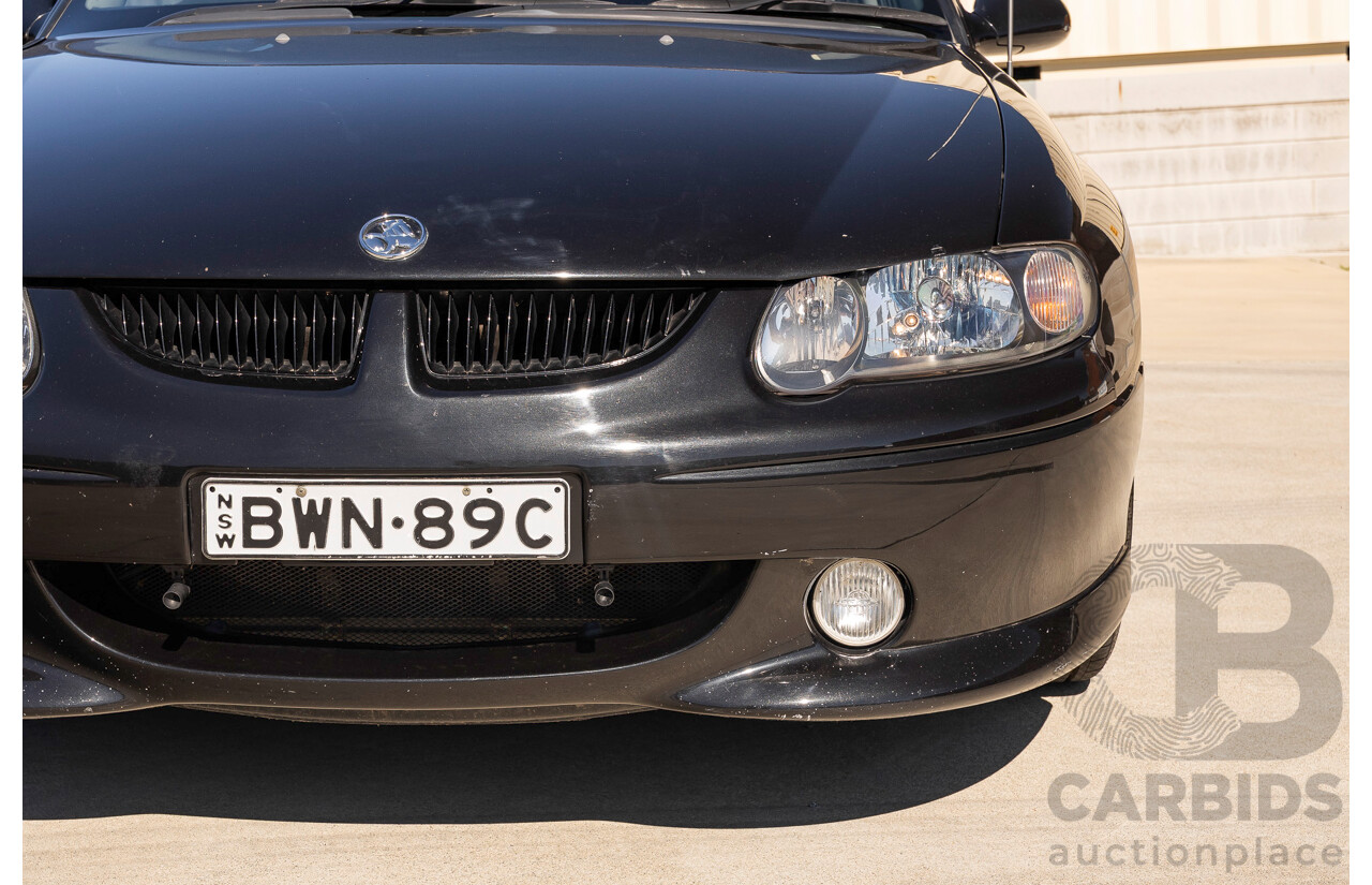 2/2002 Holden Commodore SS VXII 4d Sedan Phantom Black Metallic V8 5.7L