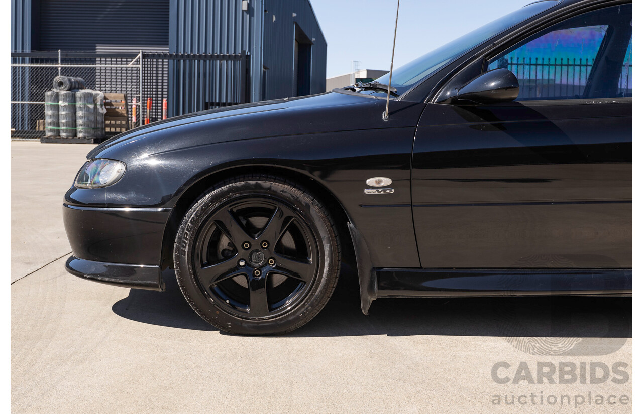 2/2002 Holden Commodore SS VXII 4d Sedan Phantom Black Metallic V8 5.7L
