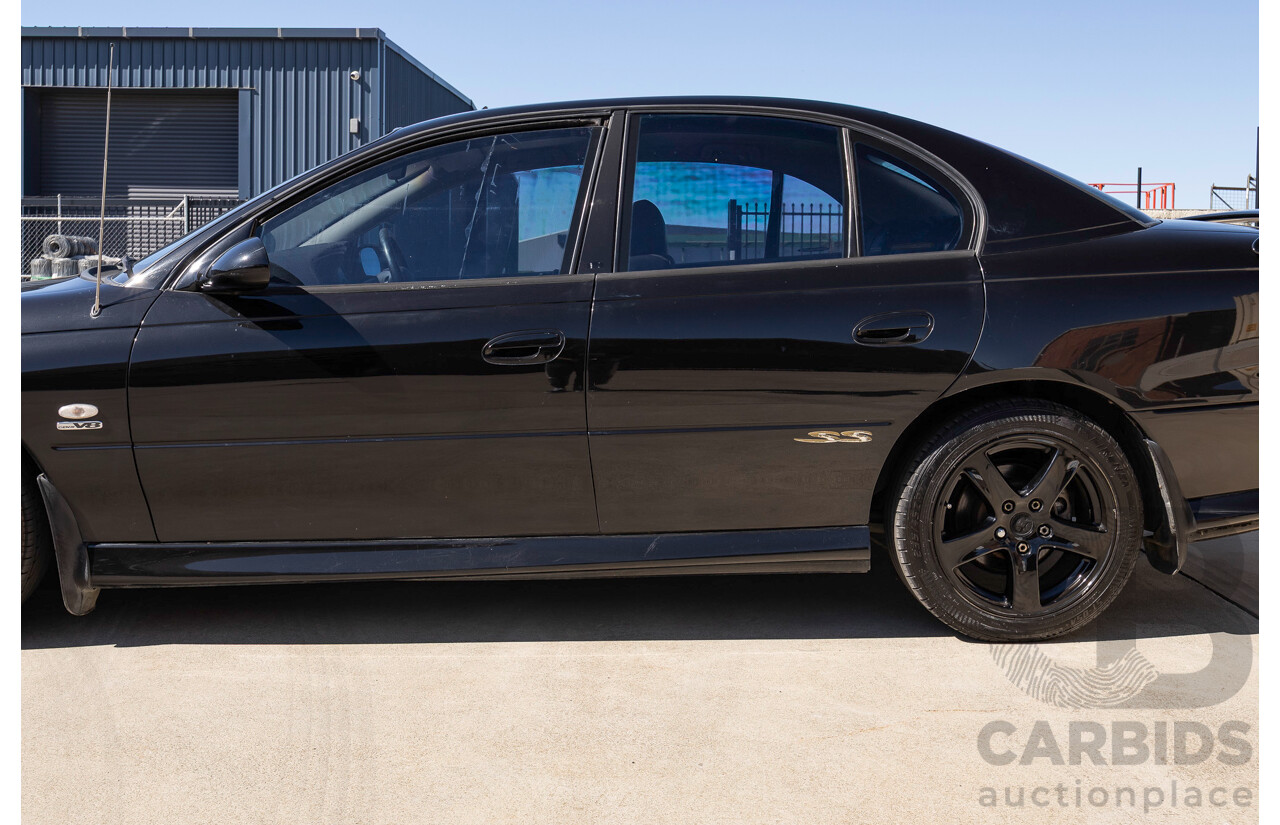 2/2002 Holden Commodore SS VXII 4d Sedan Phantom Black Metallic V8 5.7L
